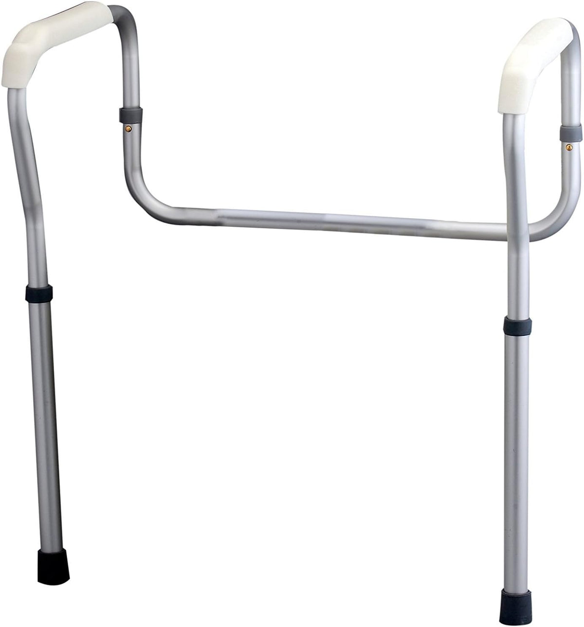 Toilet safety rail with silver aluminum frame, white padded grab handles, adjustable legs, and rubber floor tips
