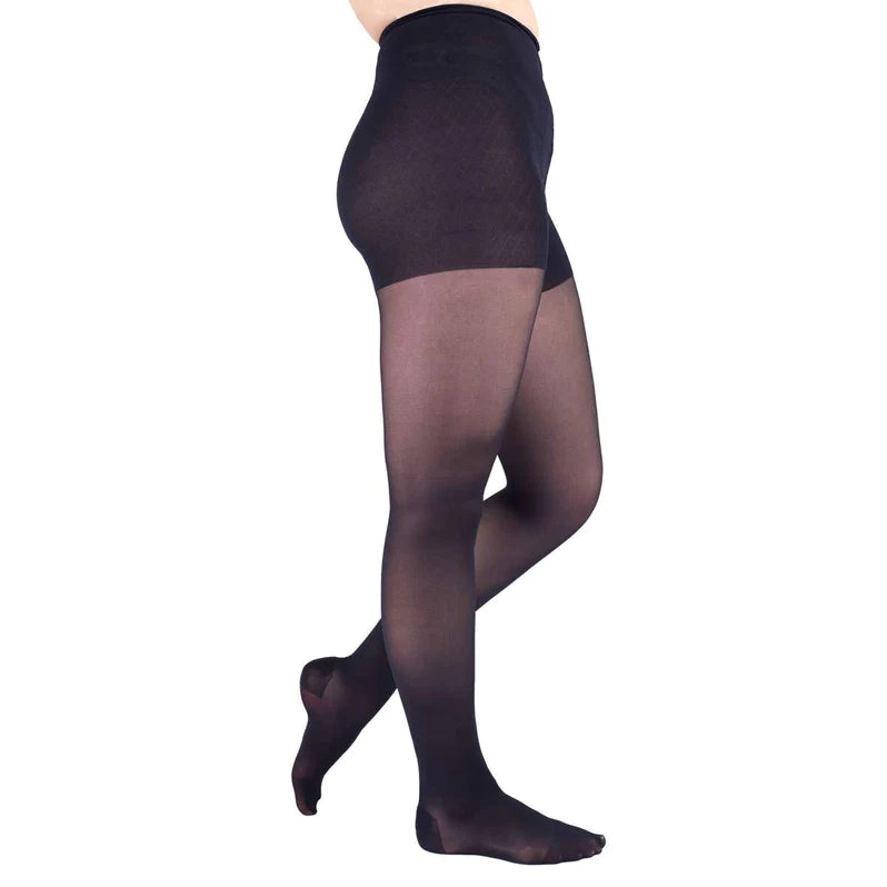 Compression pantyhose in navy with opaque waistband panel and sheer legs, shown on a standing model, side view, closed toe