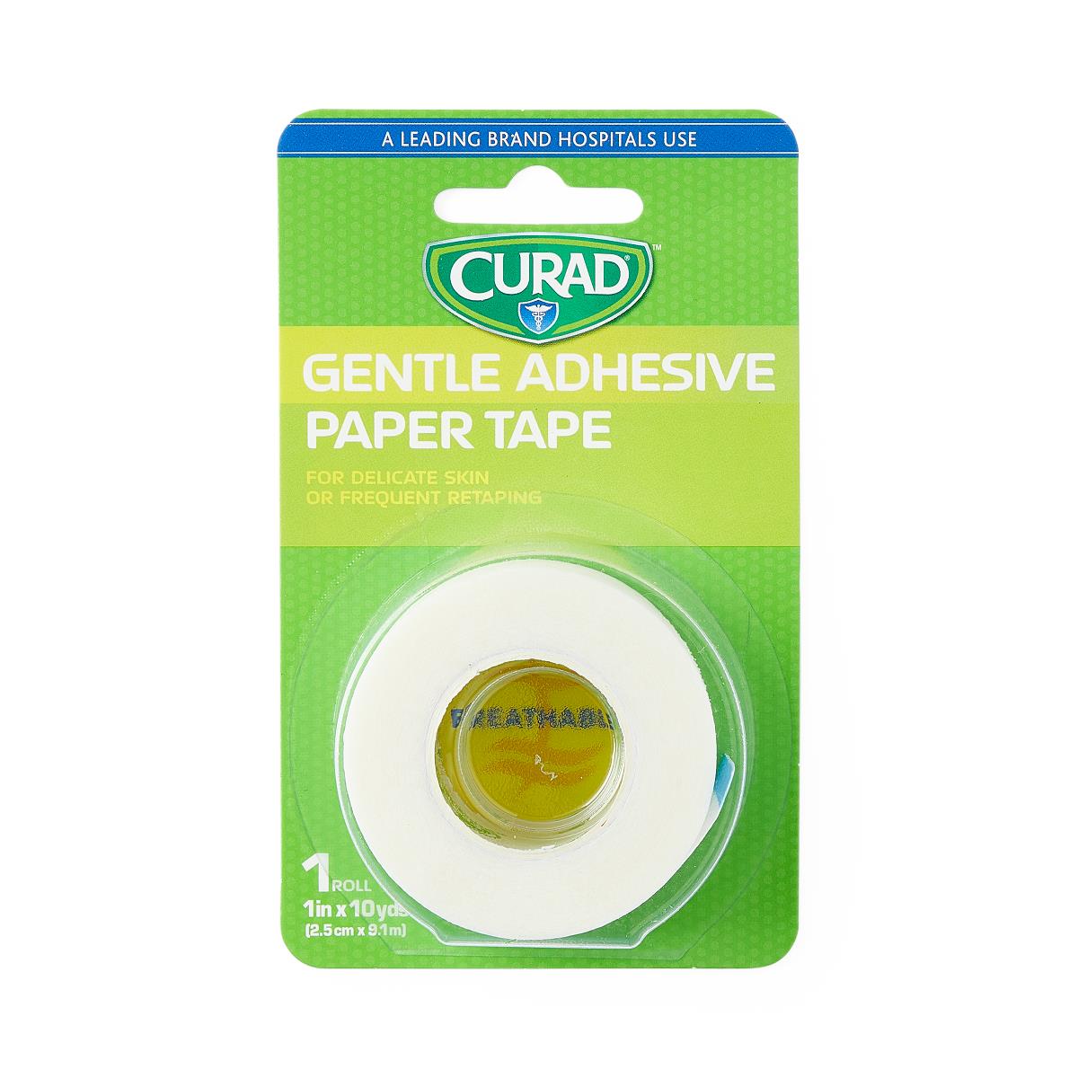 Medical paper tape roll in green Curad packaging labeled Gentle Adhesive Paper Tape, 1 inch x 10 yards, 1 roll
