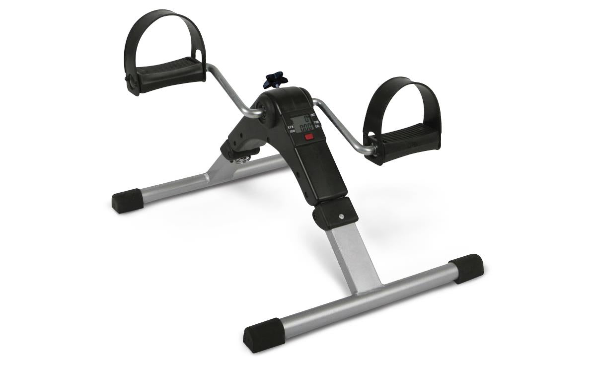 Pedal exerciser with silver metal frame, two black foot pedals with straps, and a digital display monitor