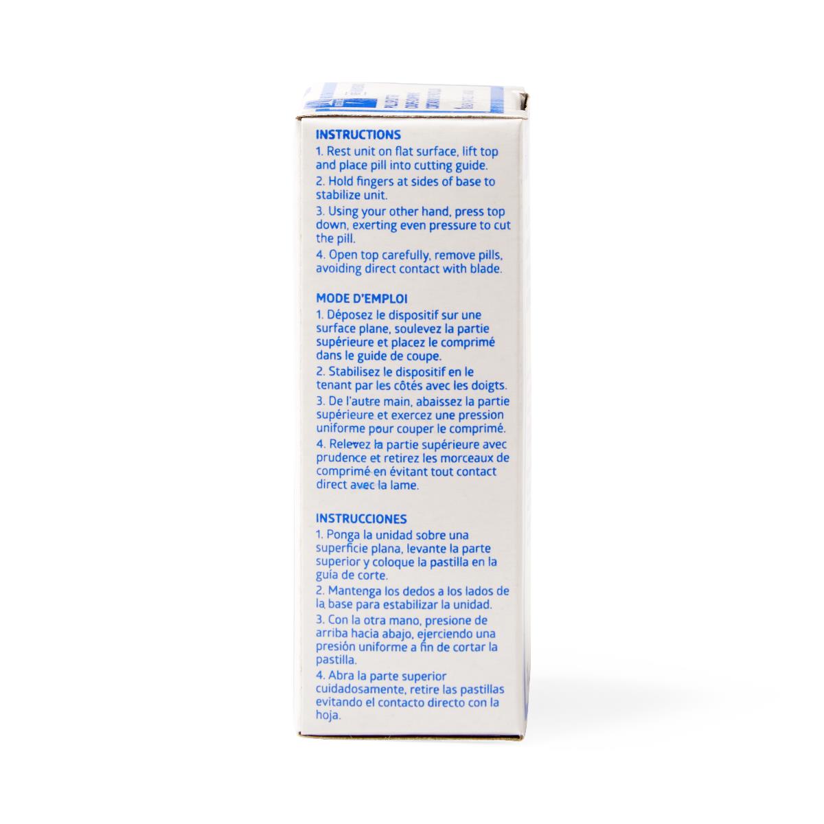 Pill splitter box side panel showing multilingual instructions in English, French, and Spanish on white cardboard with blue