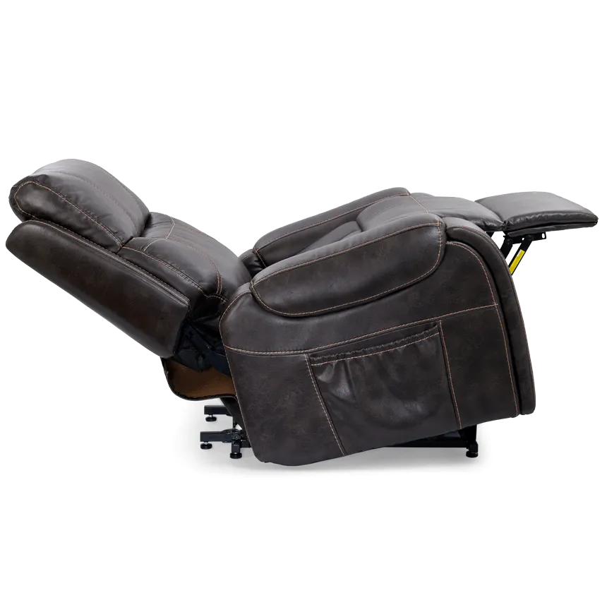 Power lift recliner chair in dark brown faux leather shown fully reclined with extended footrest and side storage pockets