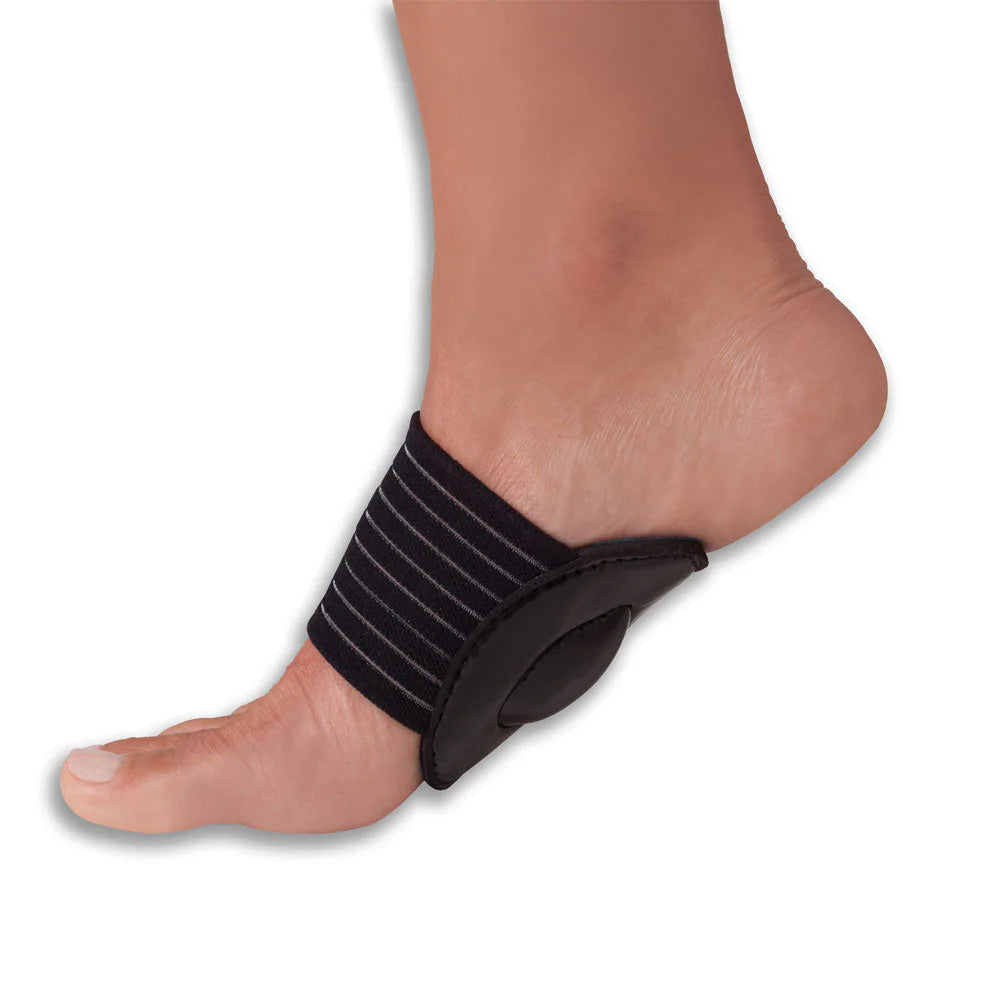Arch support wrap with cushioned pad and black elastic band worn on bare foot, shown from the side