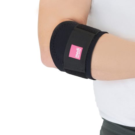 Tennis elbow strap in black neoprene with hook-and-loop closure, worn on a bent elbow against a white background