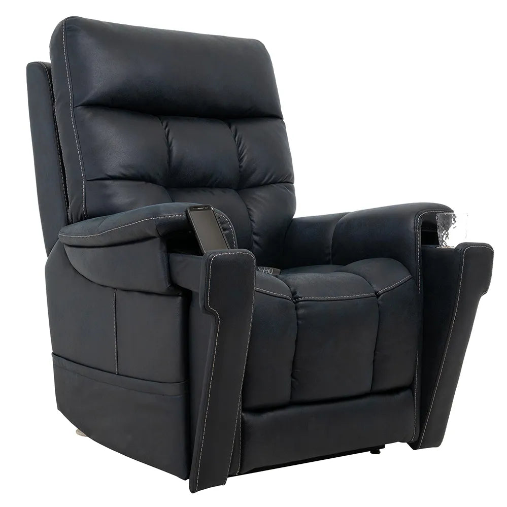 Lift chair in dark navy faux leather with tufted back, padded armrests, contrast stitching, and a side-mounted remote control