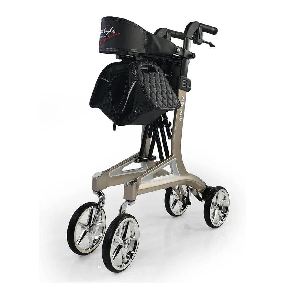 Rollator walker with champagne-colored aluminum frame, chrome spoke wheels, black quilted seat, backrest, and front storage