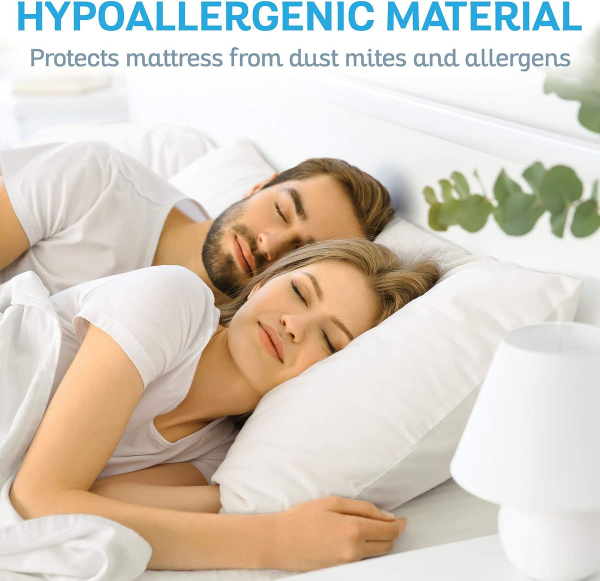 Waterproof mattress protector shown as two people sleep comfortably on a white-sheeted bed with white pillows