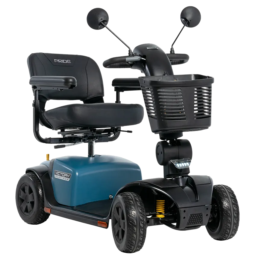 Pride Victory Platinum 4-wheel mobility scooter in blue with black captain seat, dual mirrors, front basket, and yellow