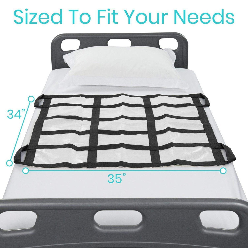 Transfer blanket with black grid straps laid on a hospital bed with pillow, shown with 34" x 35" dimension callouts