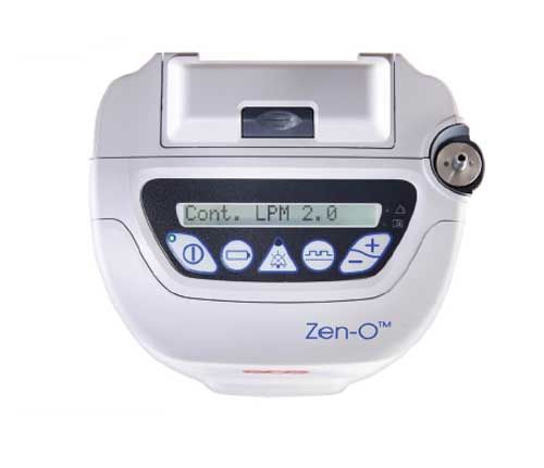 Portable oxygen concentrator with LCD display showing Cont. LPM 2.0, control buttons, and side outlet, front view
