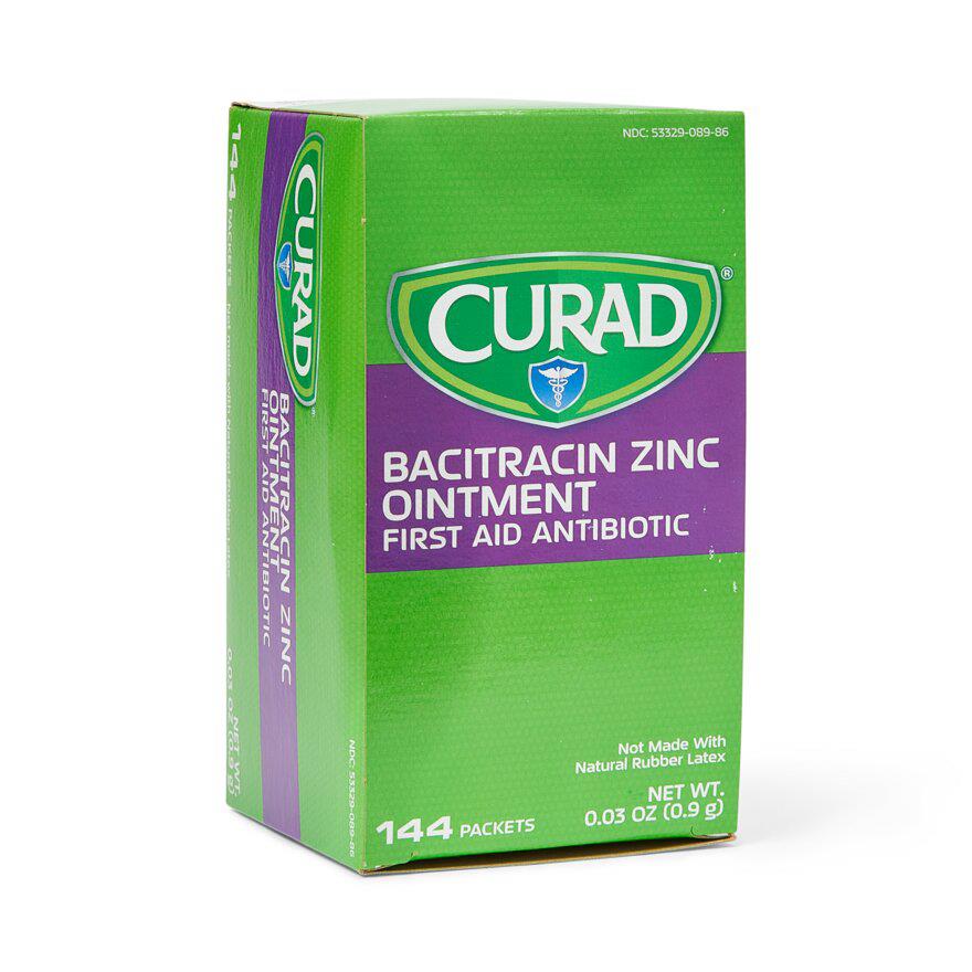 Curad Bacitracin Zinc Ointment first aid antibiotic box containing 144 foil packets, green and purple packaging