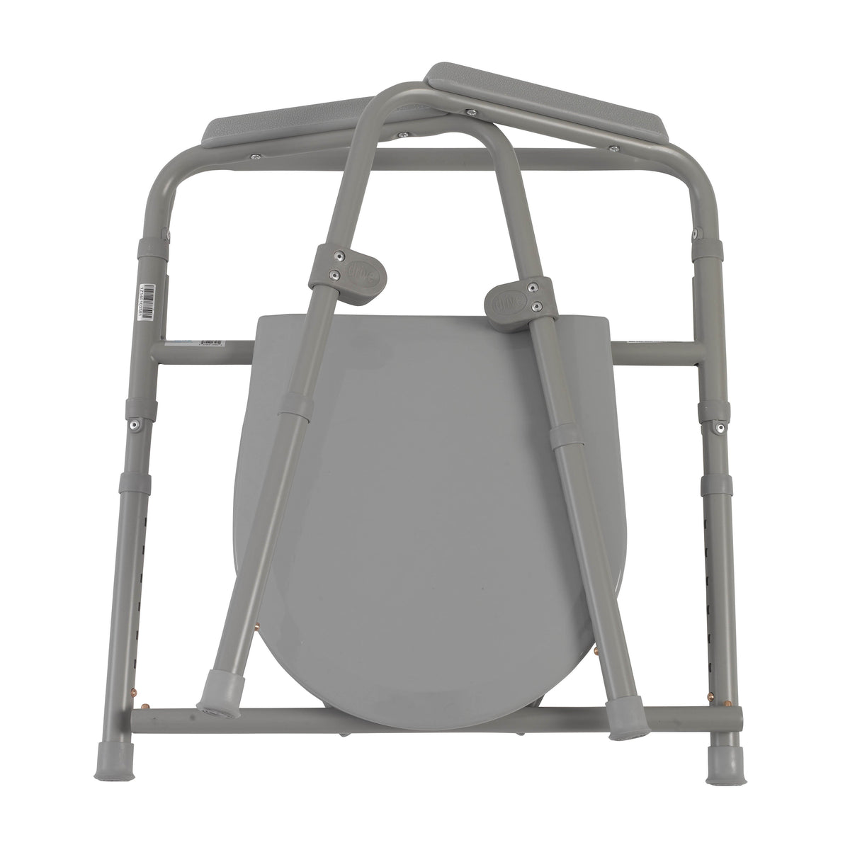 Folding steel bedside commode shown collapsed flat, gray metal frame with padded armrests and bucket, front view on white