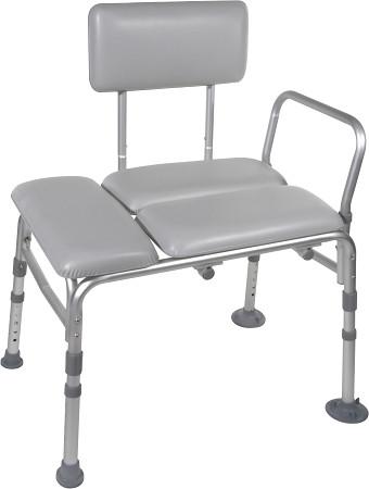 Padded transfer bench with gray vinyl cushioned seat, adjustable aluminum legs, backrest, and single armrest on white