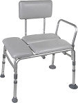 Padded seat transfer bench with gray cushioned seat, backrest, armrest, and adjustable aluminum legs