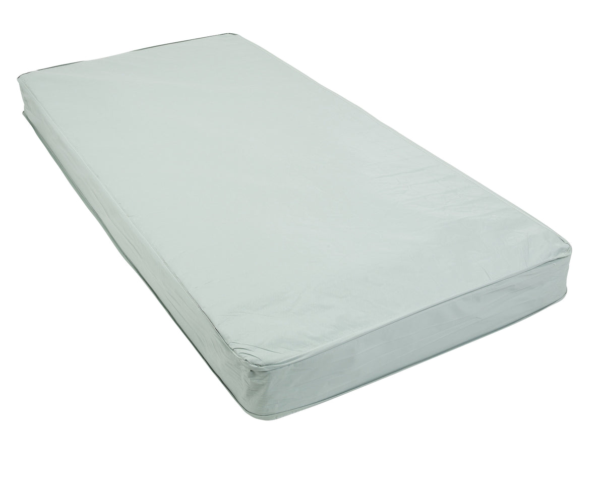 Inner spring mattress with light gray vinyl cover, shown at an angle on white background
