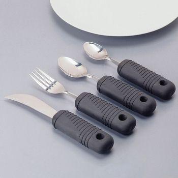 Weighted adaptive utensil set with ribbed black foam handles, including knife, fork, and two spoons