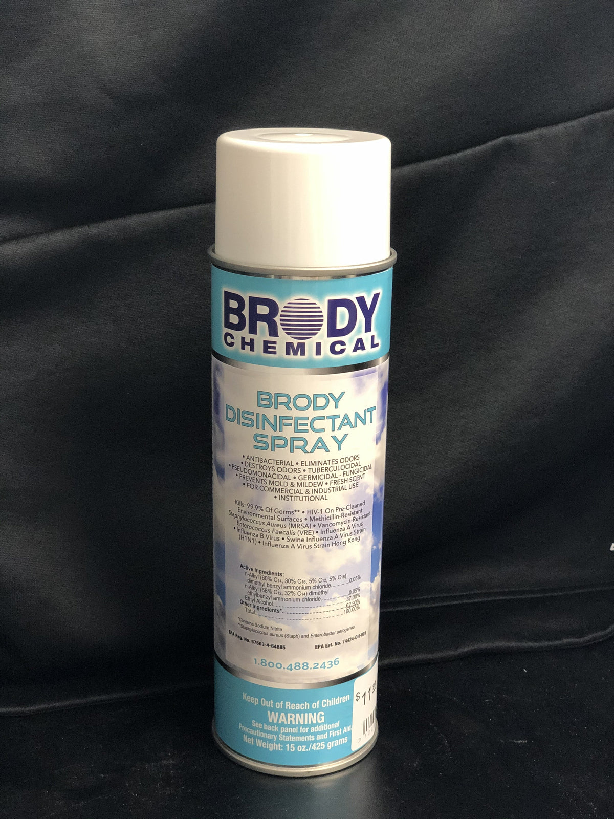 Brody Chemical disinfectant spray aerosol can with blue and white label, 15 oz net weight, on dark background