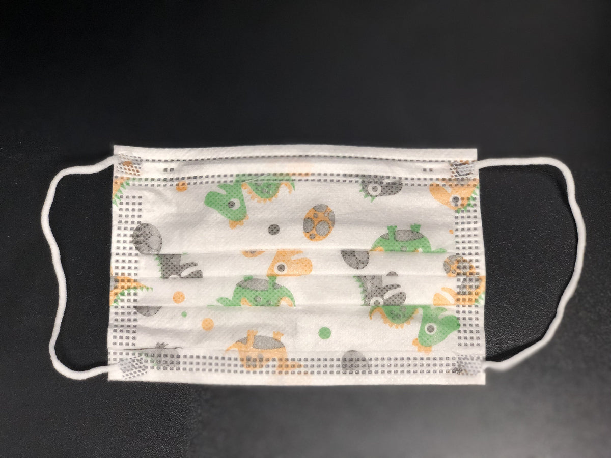 Children's disposable 3-ply pleated face mask with green and orange dinosaur print and white ear loops