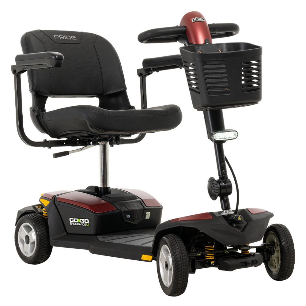 Pride Go-Go Endurance Li 4-wheel mobility scooter in red and black with padded seat, tiller controls, front basket, and