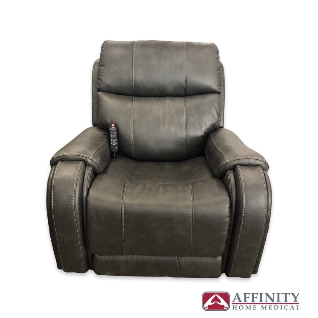 Power lift recliner chair in dark walnut suede fabric with tufted seams and wired hand control on left armrest