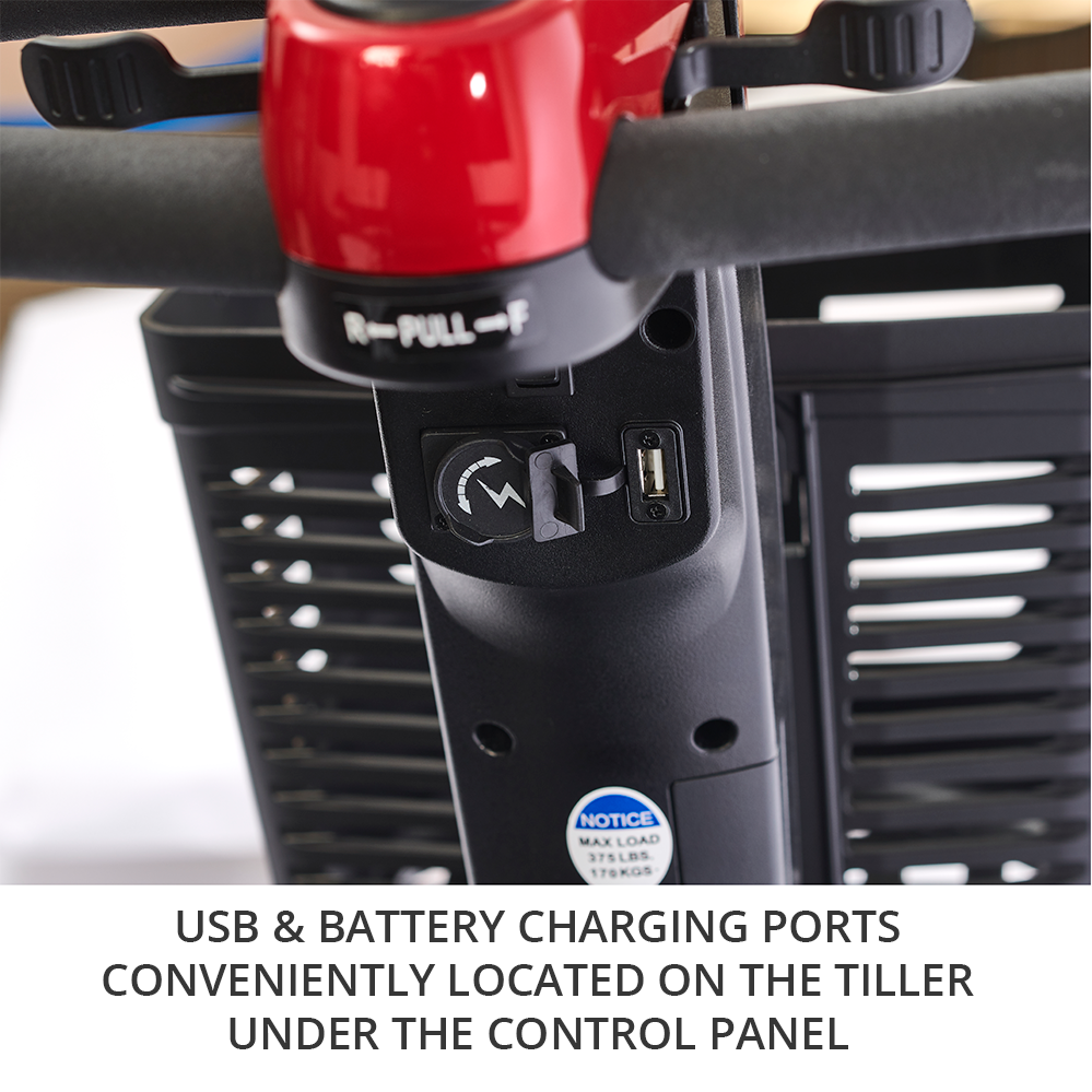 Travel scooter tiller close-up showing USB port and battery charging port beneath the control panel