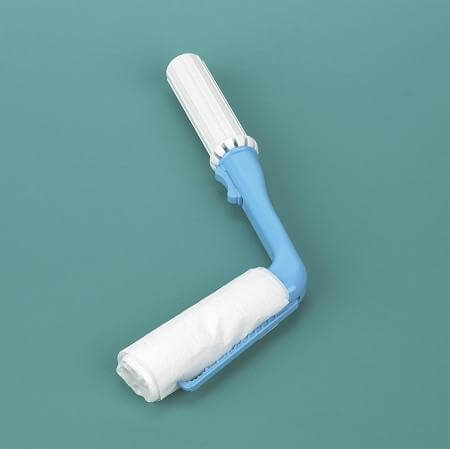 Toilet aid with white ribbed handle, blue angled arm, and attached white tissue holder on teal background