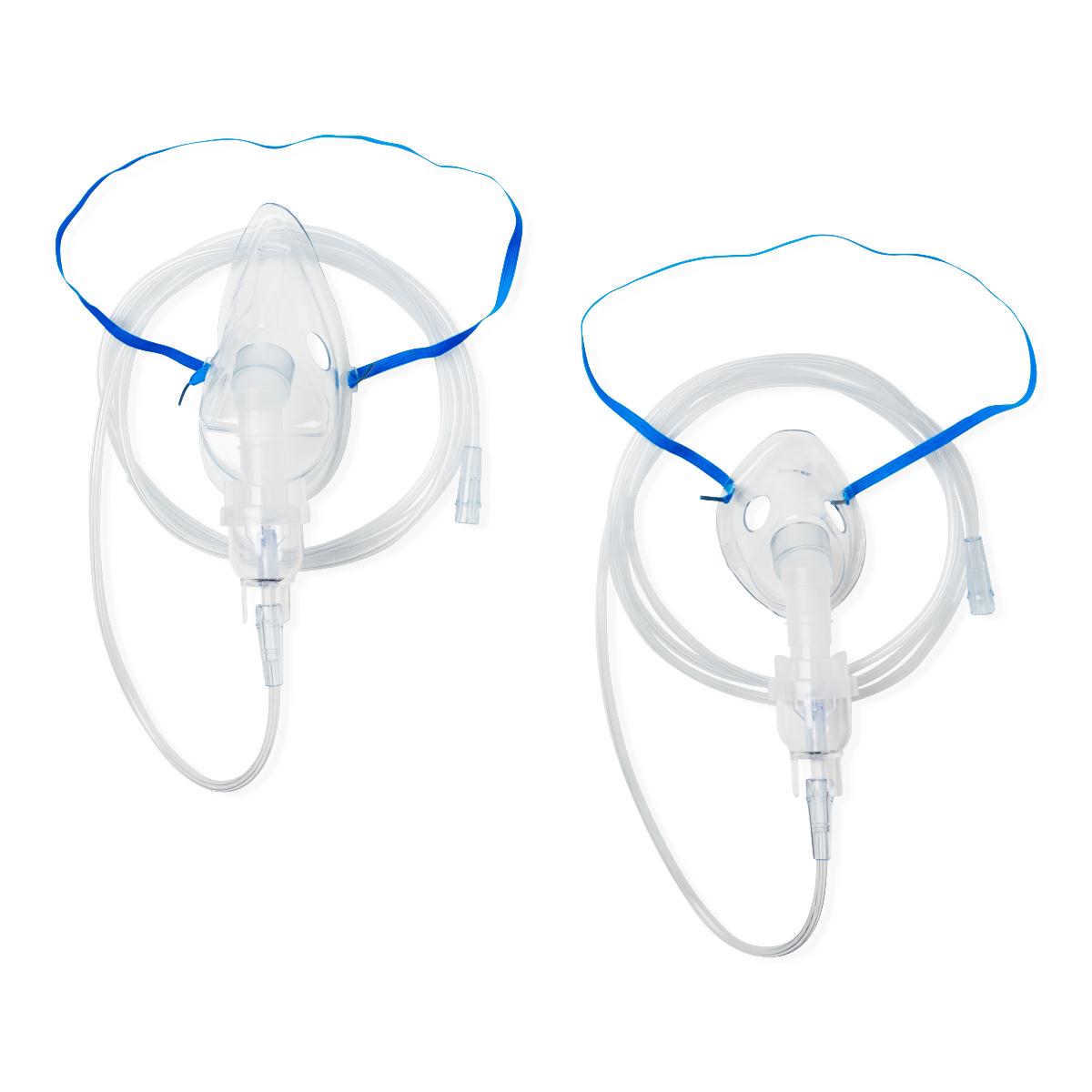 Disposable nebulizer kits with clear adult masks, blue elastic straps, and clear tubing, shown as a pair on white background