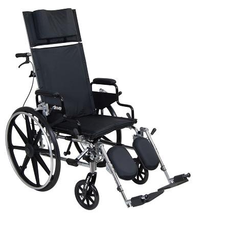 Reclining wheelchair with tall padded back, headrest, padded armrests, elevating leg rests, and large rear wheels in black