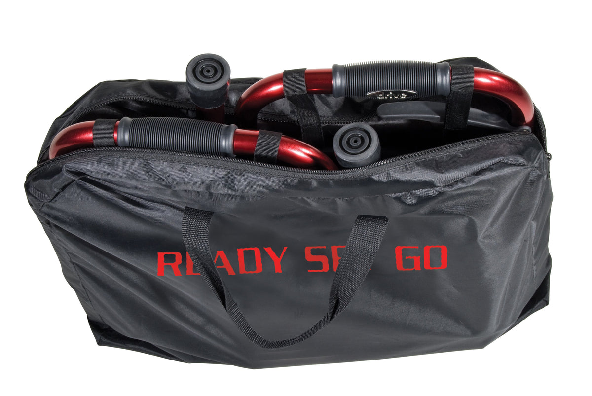 Travel walker carry bag in black nylon with red "Ready Set Go" text, holding a folded red walker with wheels and handles