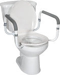 Toilet safety rail with padded armrests installed on a white toilet