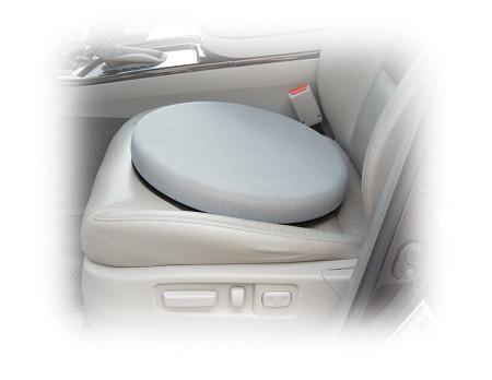 Padded swivel seat cushion in gray fabric cover placed on a beige leather car seat