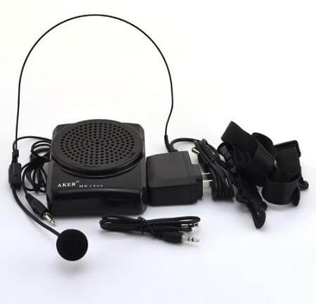Portable voice amplifier with headset microphone, belt clip, power adapter, and audio cable, all in black